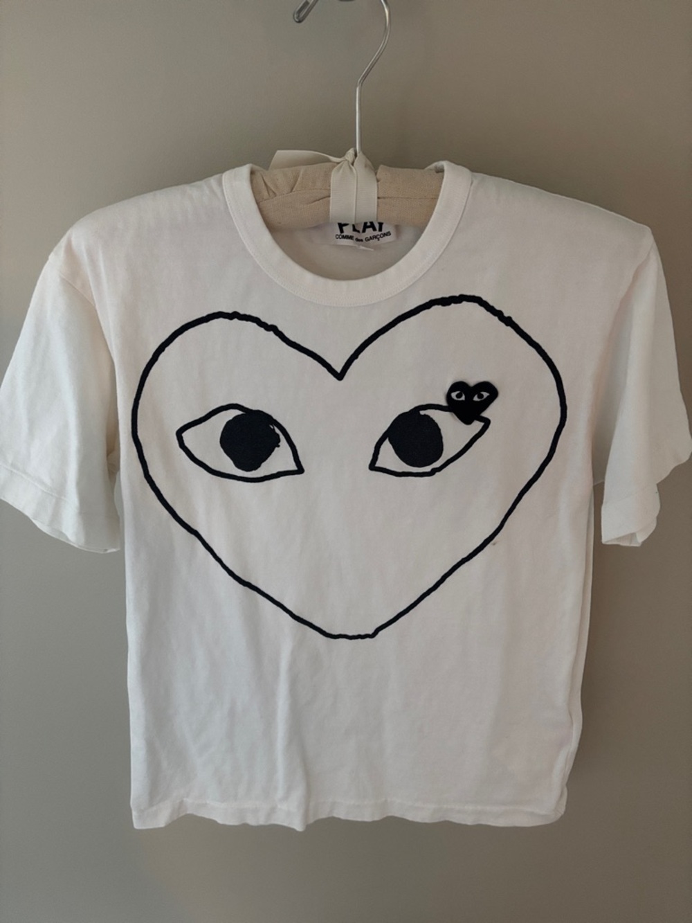 Comme des Garçons PLAY White Tee with Large Black Heart Eyes Graphic M